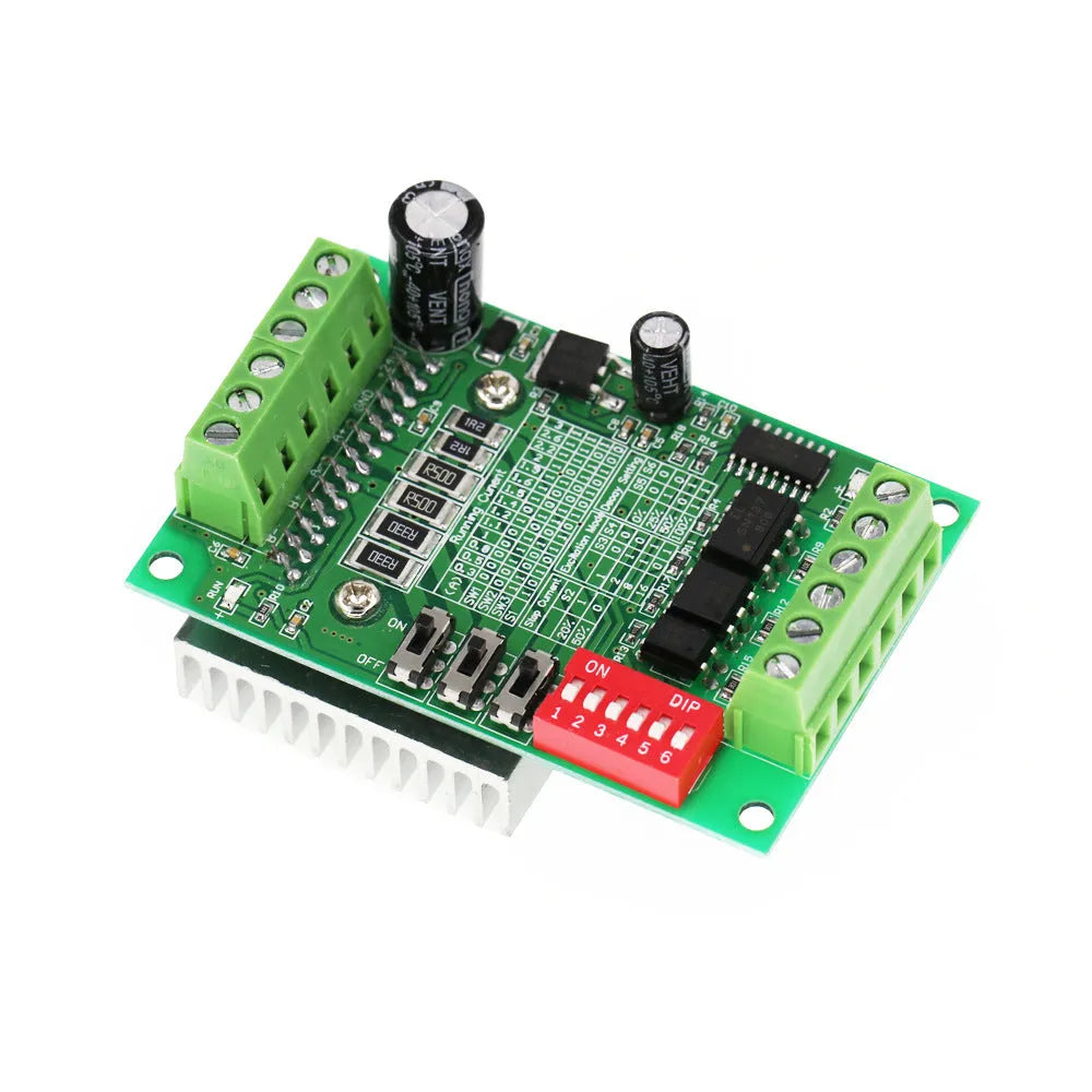 TB6560 stepper motor driver module on a green PCB with aluminium heatsink and screw terminals.