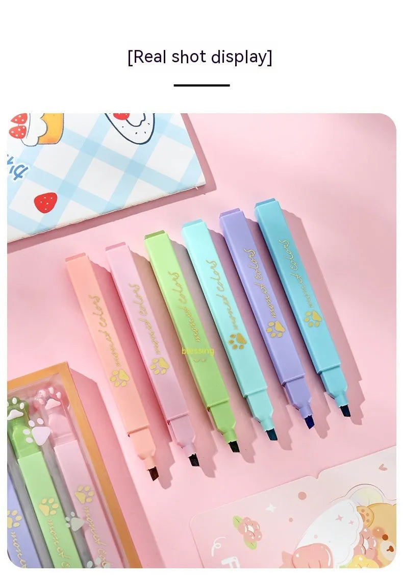 Cat's Paw set of six fluorescent marking pens with oblique heads in a box.