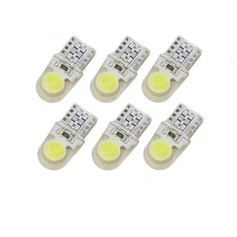 Ten T10 wedge base LED bulbs with silicone housing in a pack, showing multiple colour options