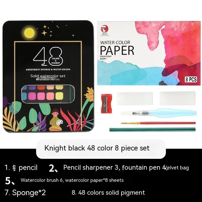 Box of 48 solid watercolour paint blocks for gouache, showing colours including Black Knight, Girl Pink, and Sunshine Blue.