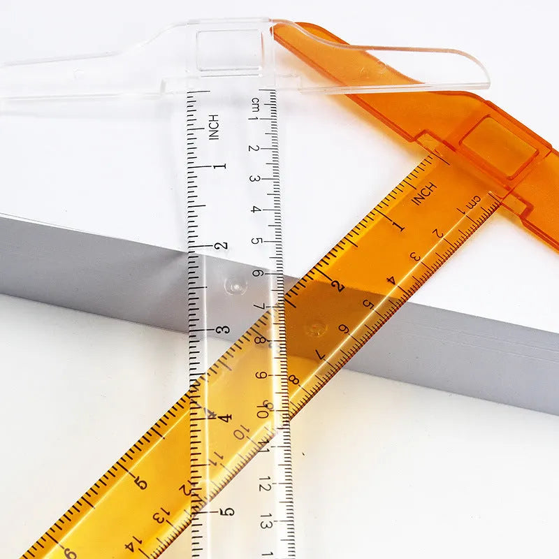 Orange or transparent plastic T-square ruler with dual measurement scales for technical drawing
