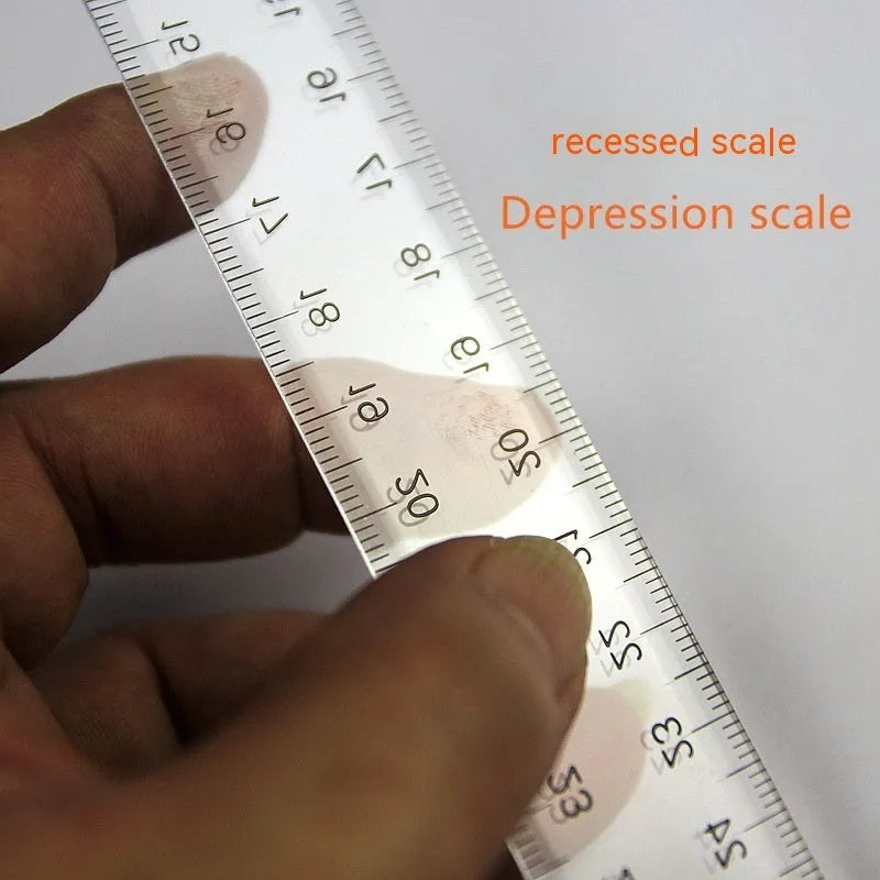 Orange or transparent plastic T-square ruler with dual measurement scales for technical drawing