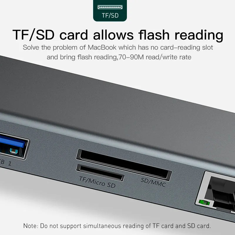 Grey aluminium ten-port laptop docking station with cooling bracket showing HDMI, VGA and USB connections