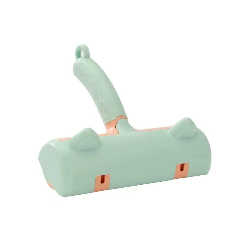 Mint green and twilight grey cat hair removal brush with two head style options on a white background.