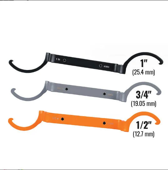 Three colour-coded magnetic suction catheter locking wrenches: orange, grey, and black, arranged as a tool set.