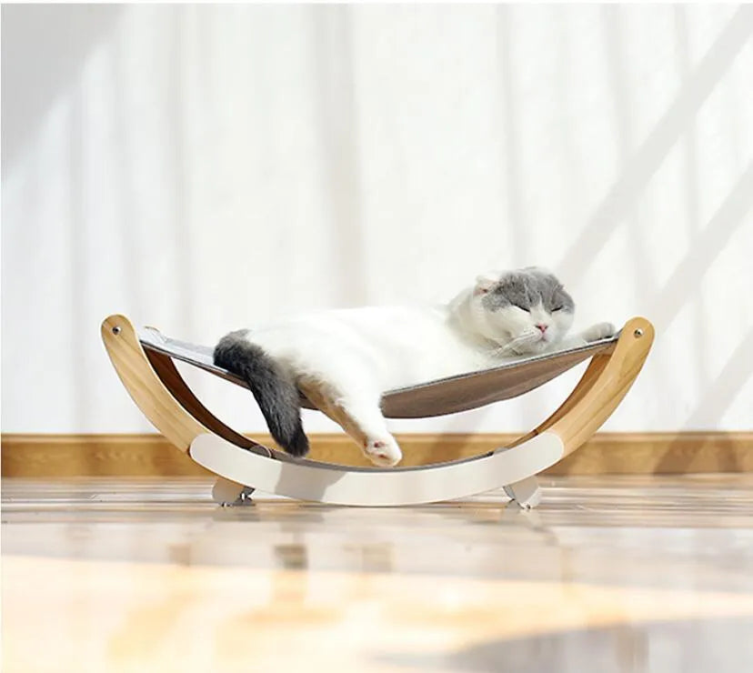 Solid wood cat shaker pet nest with off-ground design, anti-slip mat, and grey or blue cloth cushion, 56.5x30cm