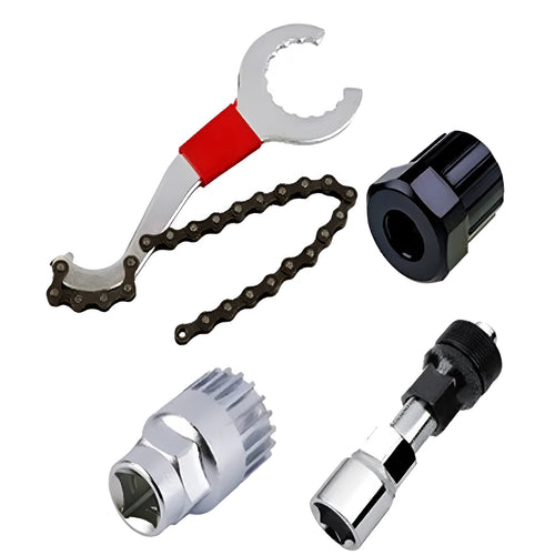 Bicycle maintenance tool set with silver chain cutter and spoke wrench on workshop bench