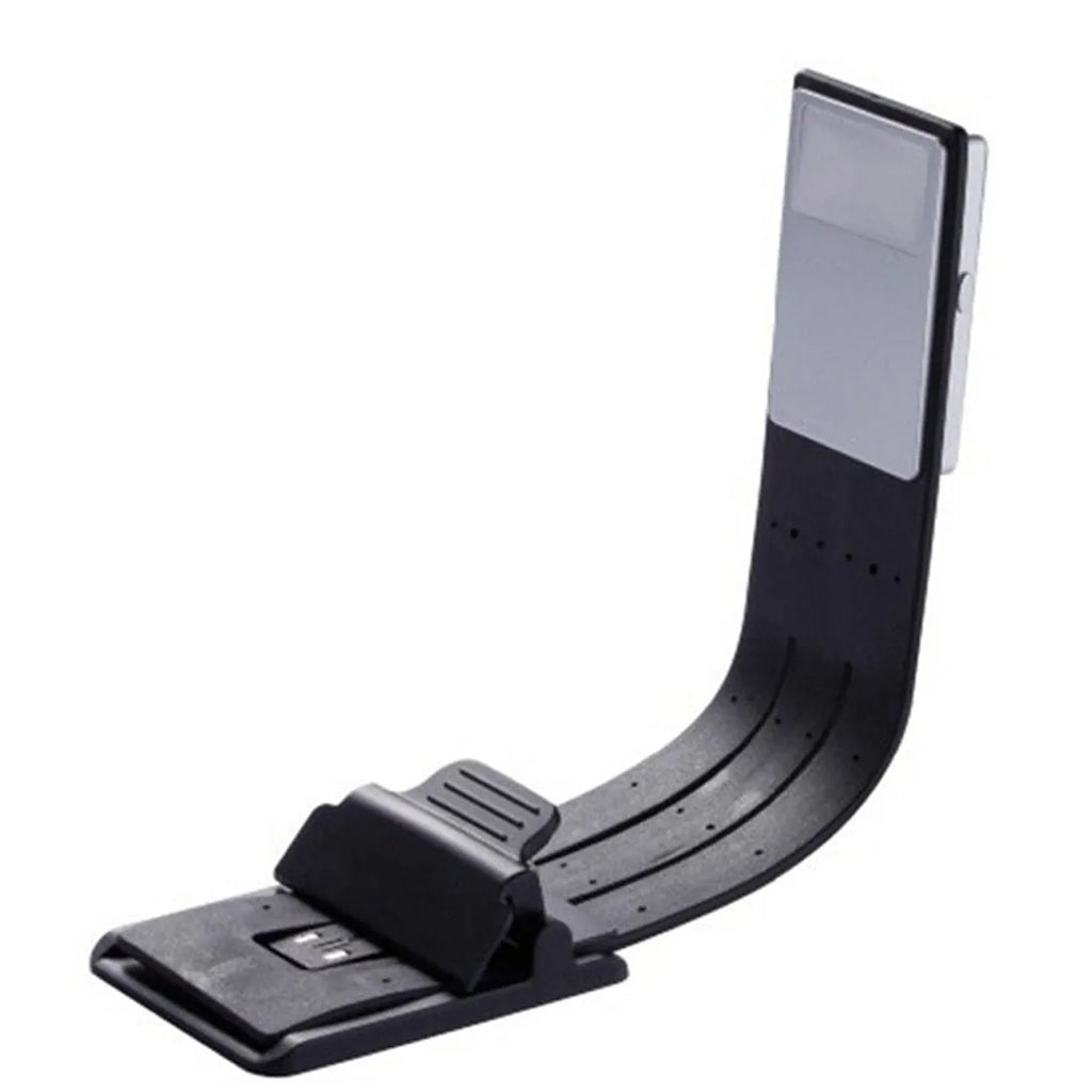 LEDGLE black USB rechargeable flexible clip LED book light with frosted panel and silicone arm on an e-reader