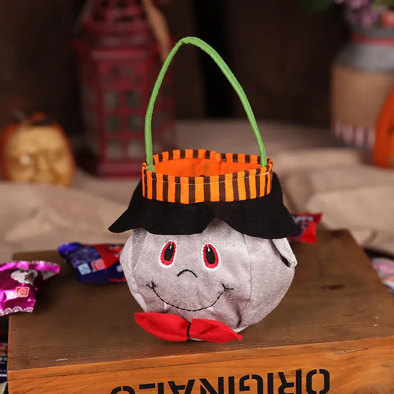 Halloween candy bag with pumpkin design measuring 16cm by 16cm