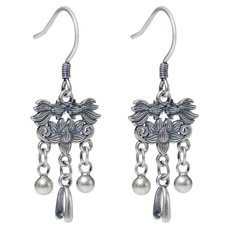 Pair of handmade 925 sterling silver koi earrings with silver colour and drop ear hook design