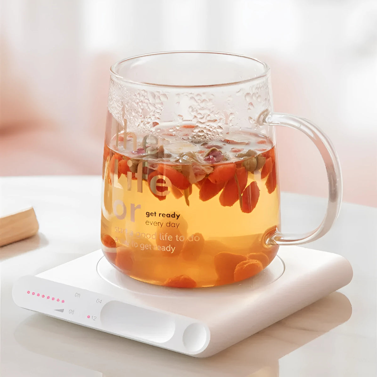 USB heating cup pad in pink or white with 10W 5V rating and mechanical control