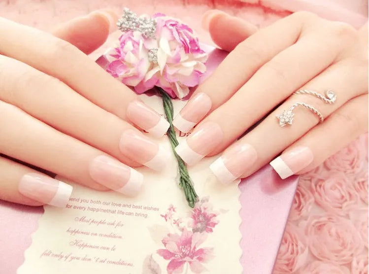 Set of finished French long fake nail patches in light pink, rose red, and white