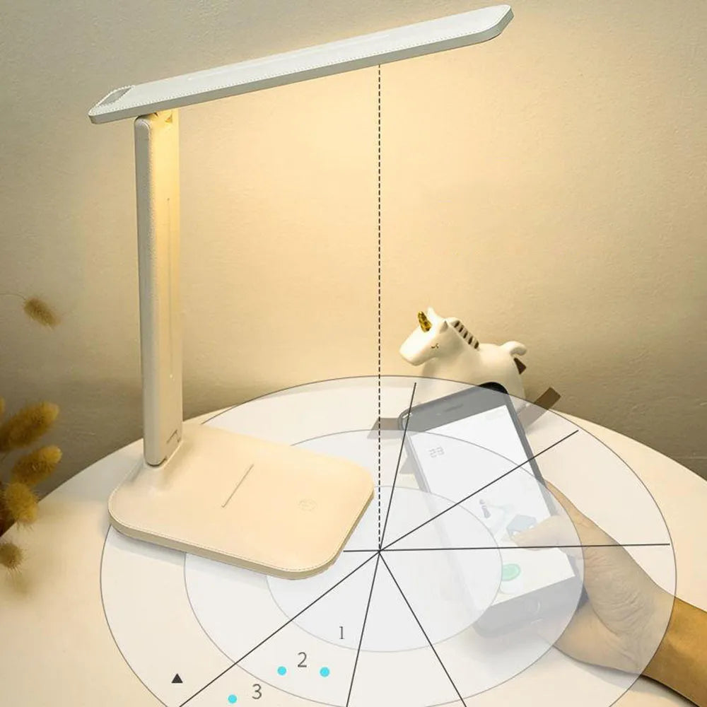 White plastic USB rechargeable bedside lamp with touch dimming for children's bedrooms.