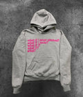 Black and grey heavy hooded sweater with printed letter graphics, showing front view with hood up