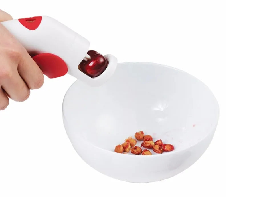 Cherry kernel remover kitchen tool with suction cup base for pitting fruit