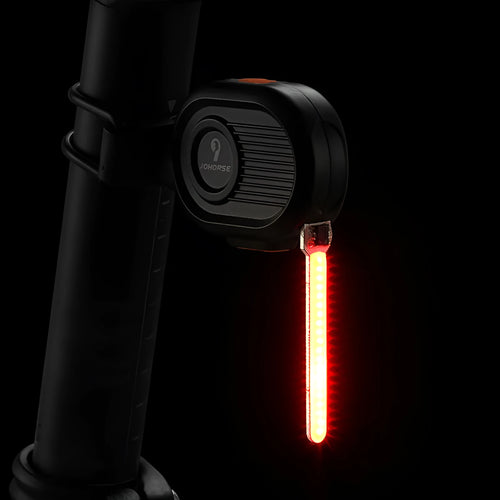 USB rechargeable bicycle tail light with blue waterfall or running water lighting effect on a bike seat post.