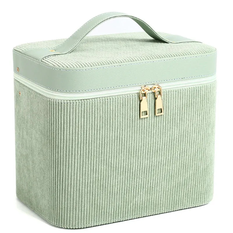 Large corduroy cosmetic storage case with a soft interior lining, shown in a solid colour.