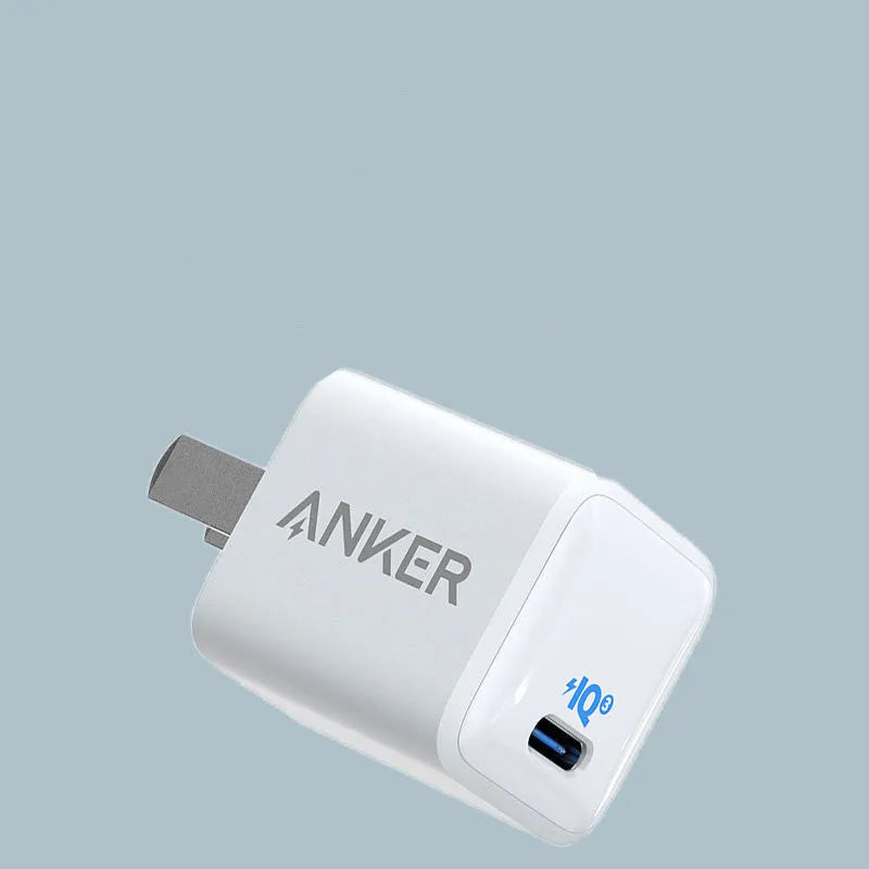 White 18W USB travel phone charger with fast charging capability for mobile devices