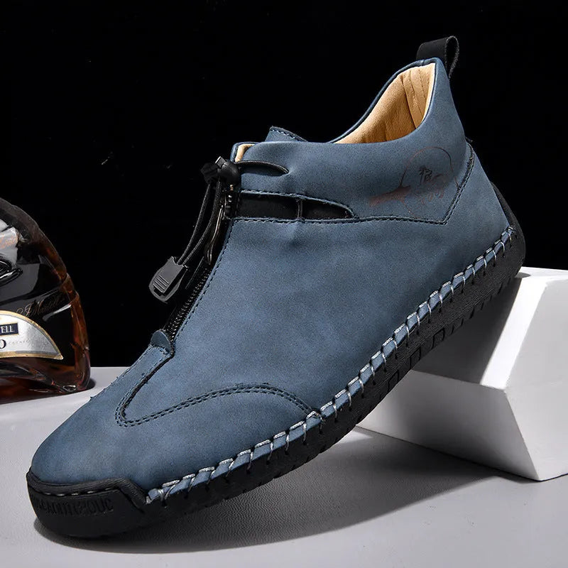 Men's casual leather shoes in black with round toe and mid heel height