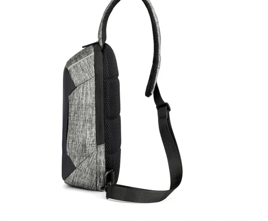 Dark blue Oxford cloth chest bag with zipper and adjustable strap, shown front-on.