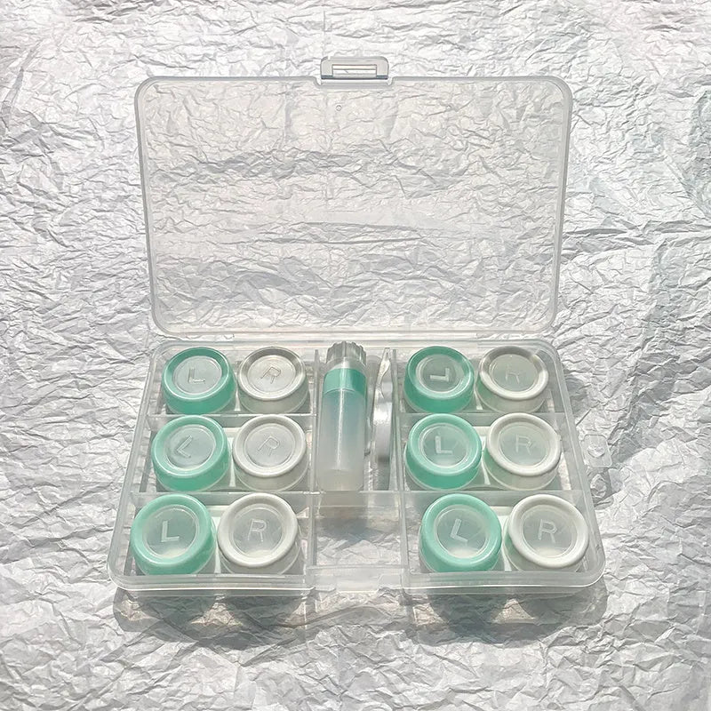 Rectangular contact lens case in various colour combinations including black white and pink white