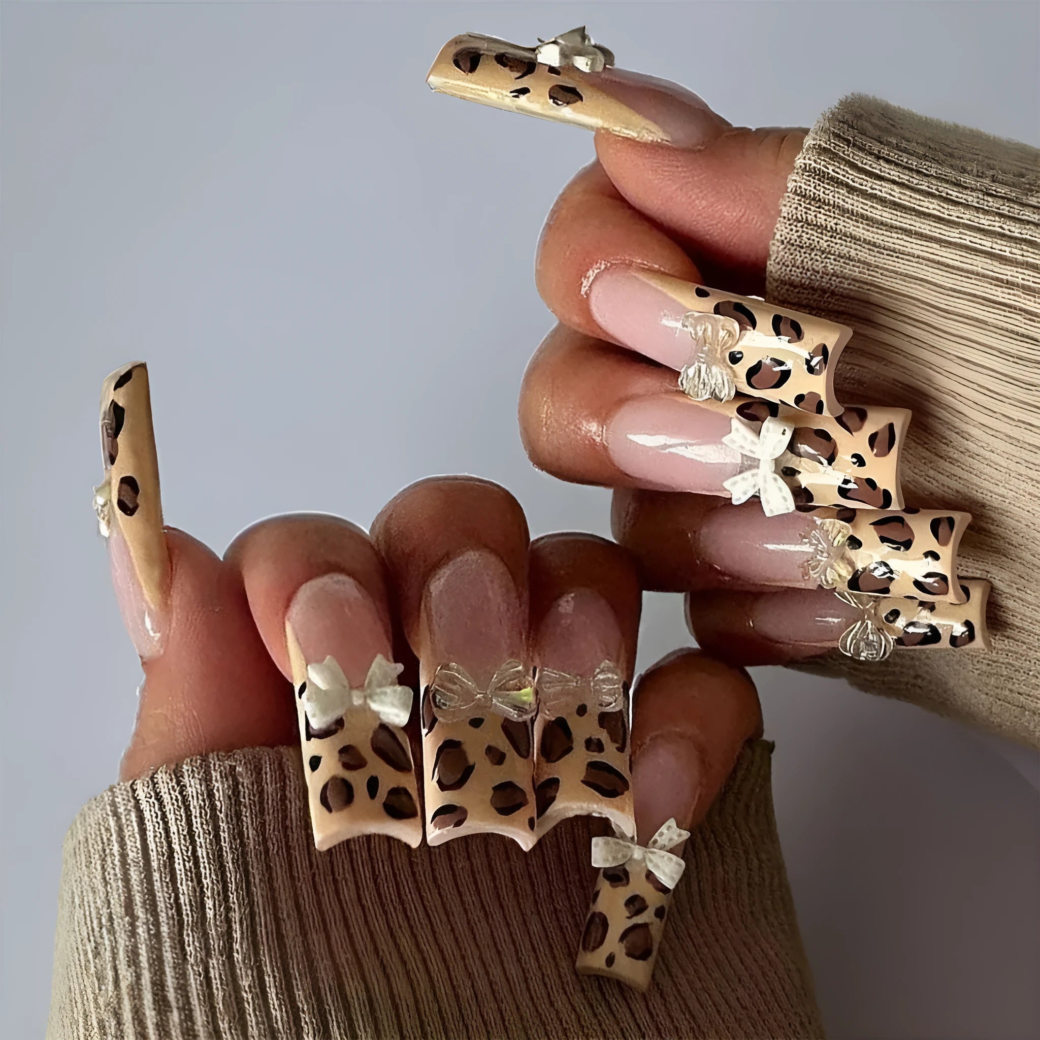 Leopard print butterfly design on plastic nail art pieces, colour WM296