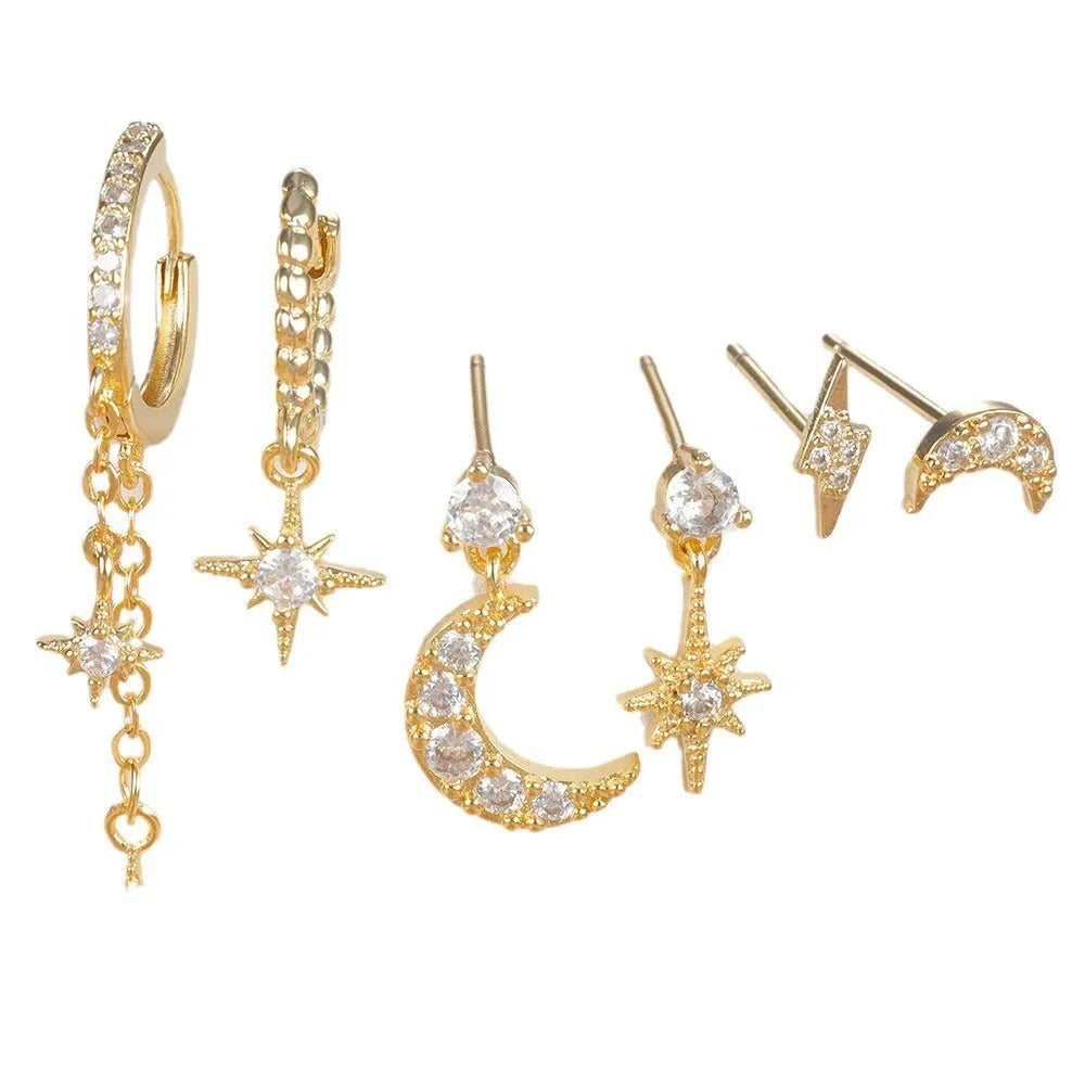 XINGX six-pair gold chain tassel earrings set with zircon studs on jewellery display