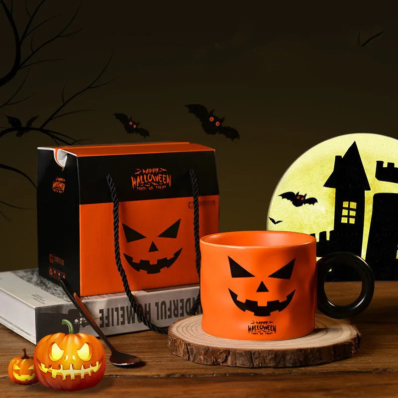 Orange and white Halloween pumpkin-shaped ceramic mug with handle on a table.