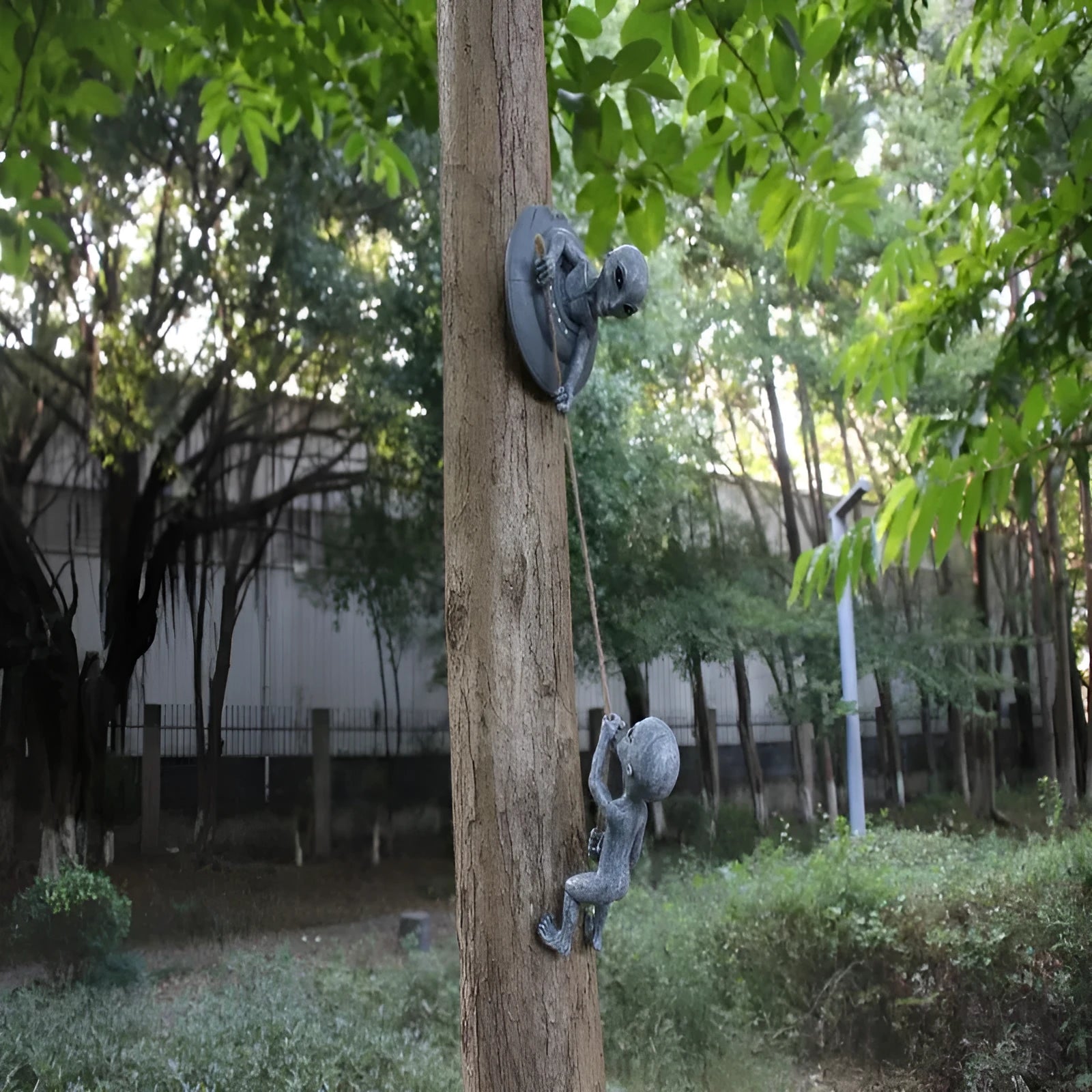 Grey resin alien tree pendant courtyard decoration with carved details, shown from the front.