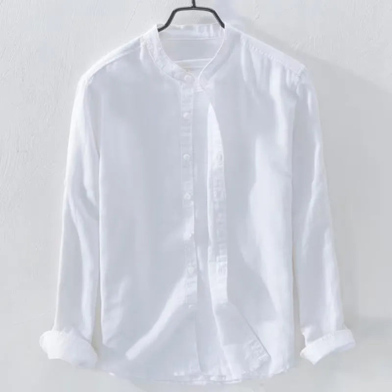A man's loose-fitting, long-sleeve casual shirt in a cotton linen blend, shown in a solid colour.