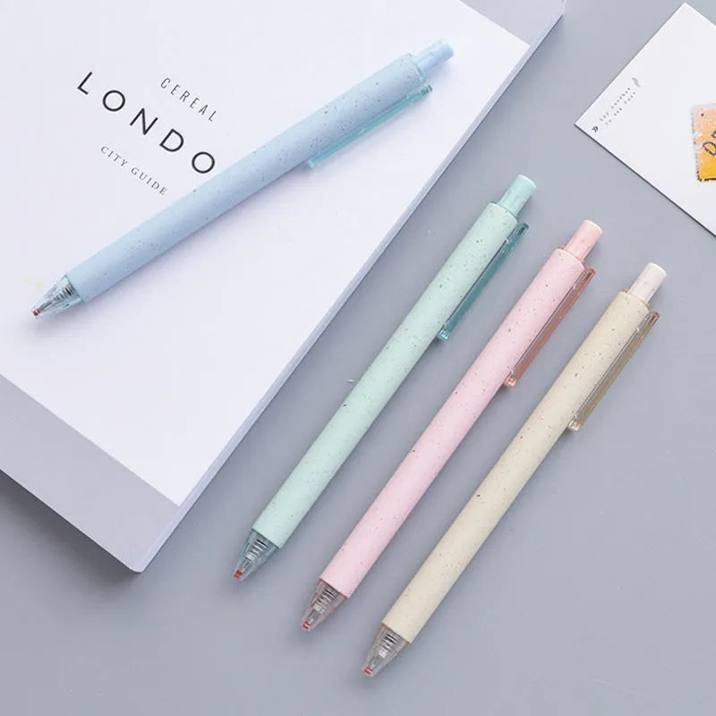 Set of 12 push-type 0.5mm gel pens in beige, blue, green, and pink colours on a white background