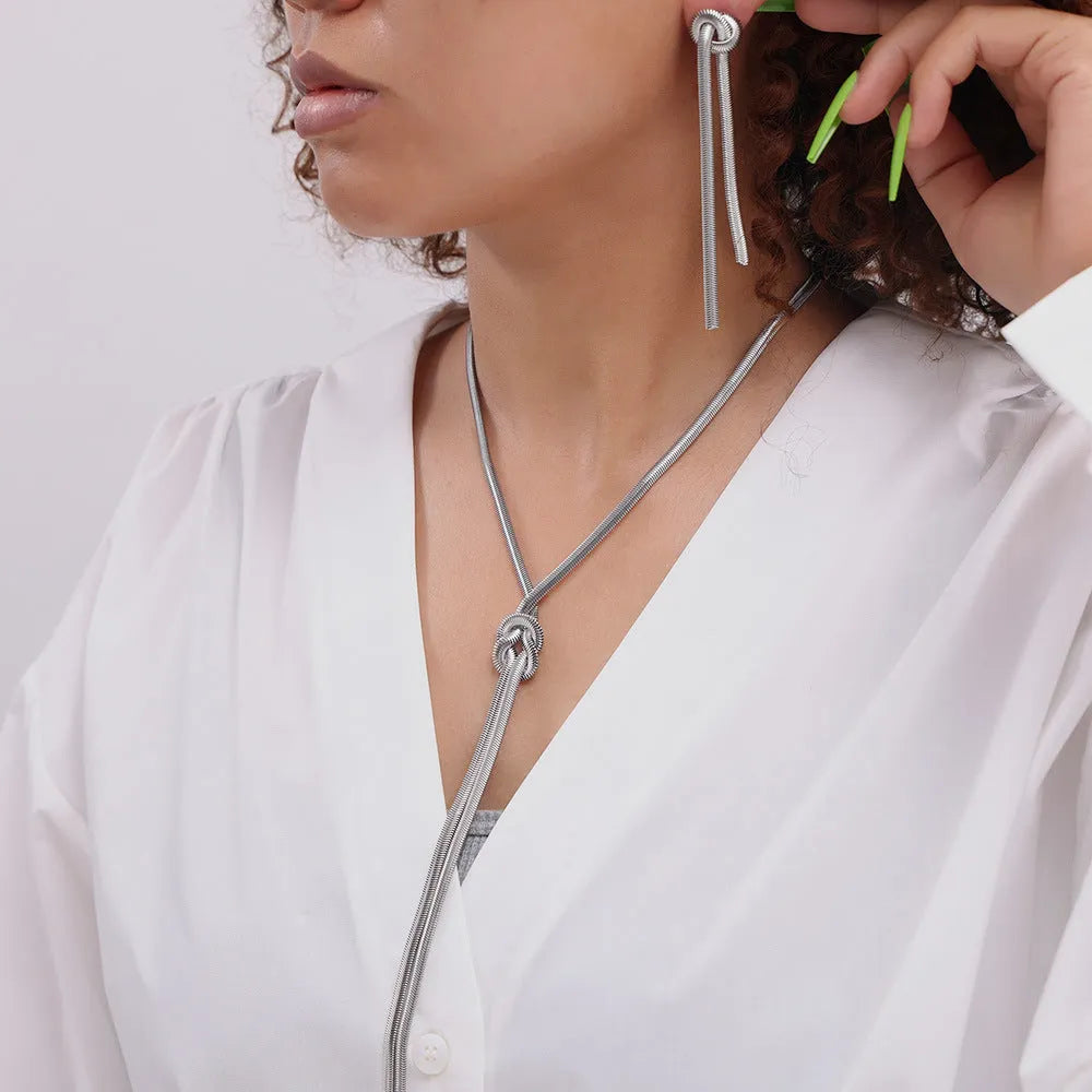 Gold knotted tassel snake chain long necklace with matching titanium steel electroplated earrings