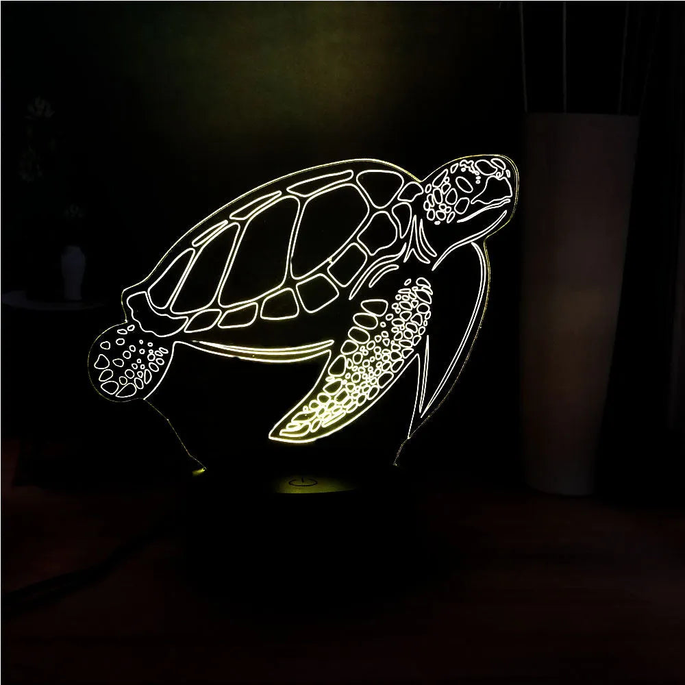 3D clear acrylic turtle-shaped LED night light with multi-coloured illumination.