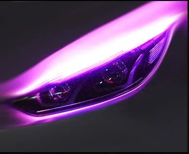 Flexible silicone car LED light strip for daytime running and flowing turn signals, showing wire connections.
