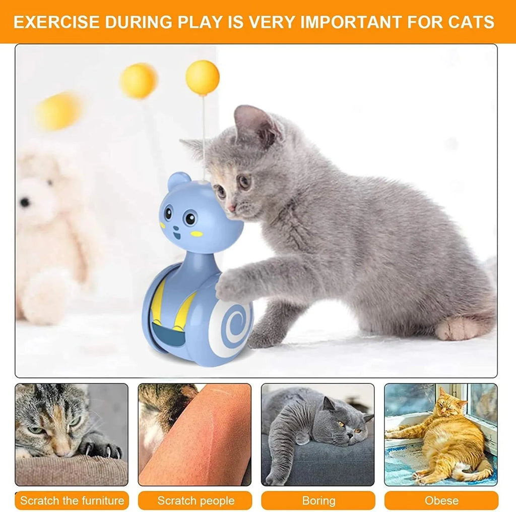 Cat interactive feather wand toy with rotating ball on plastic base in pink colour