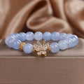 Sky blue butterfly crystal bracelet for women with pearls, rhinestones, and sequins on a 17cm chain.