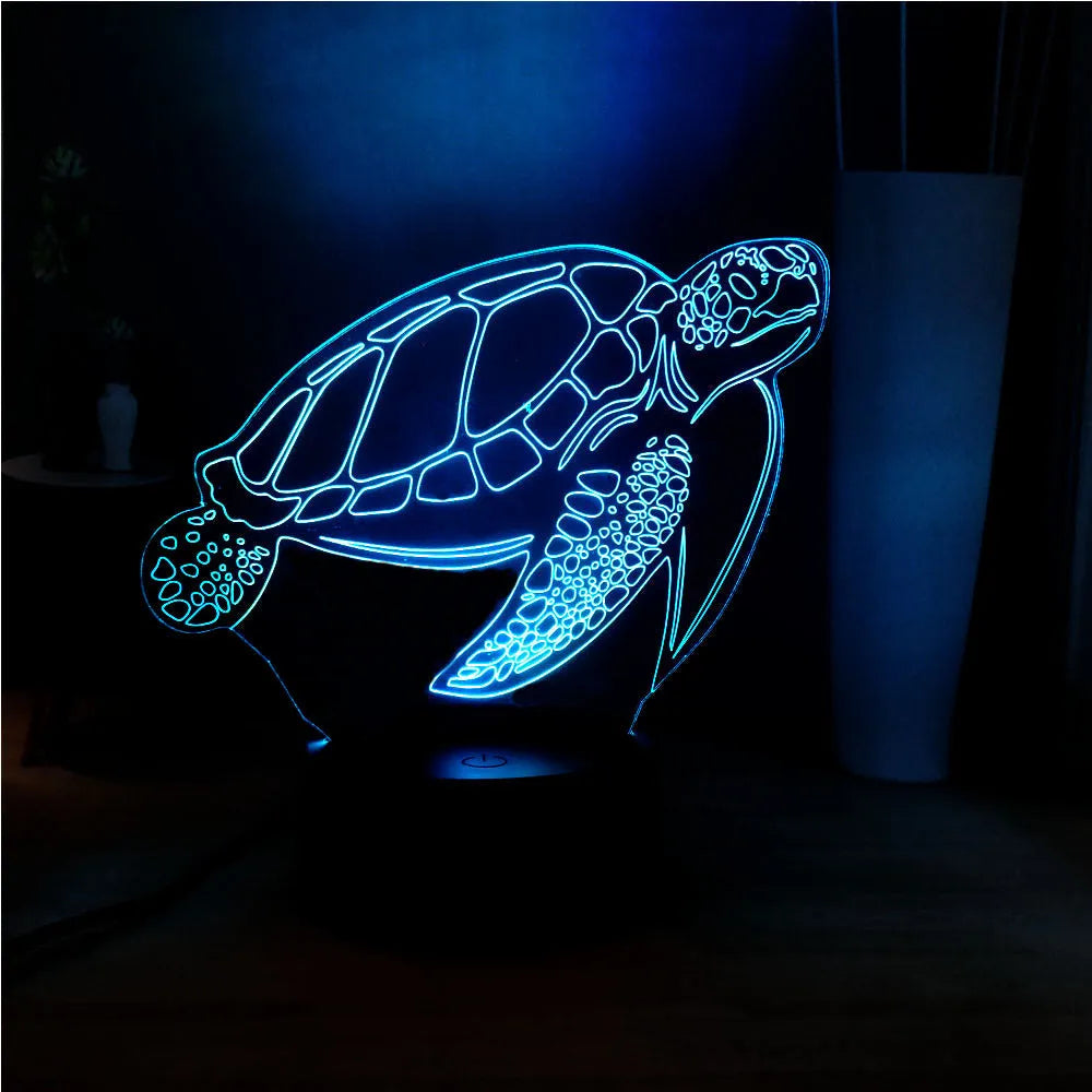 3D clear acrylic turtle-shaped LED night light with multi-coloured illumination.