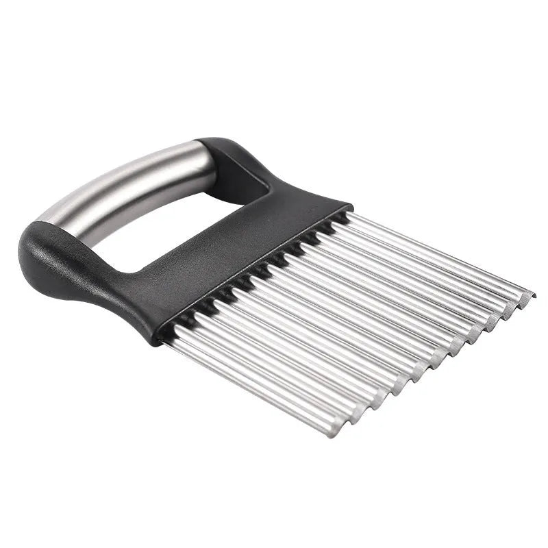 Stainless steel potato wave knife for making crinkle-cut chips on a kitchen worktop.