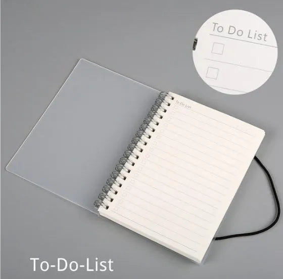 Plastic cover spiral coil notebook with transparent PVC cover and elastic rope, A5 size, cream paper pages visible
