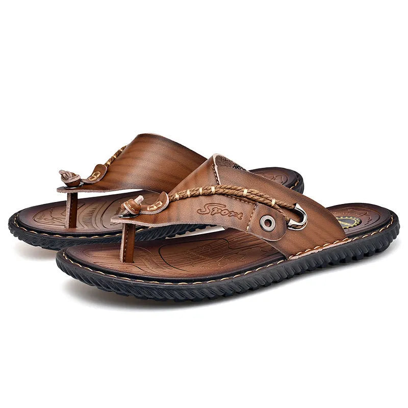 Men's black lightweight slippers with non-slip soles on wooden floor