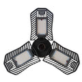 Waterproof foldable industrial garage lamp with die-cast aluminium housing on a workshop bench.
