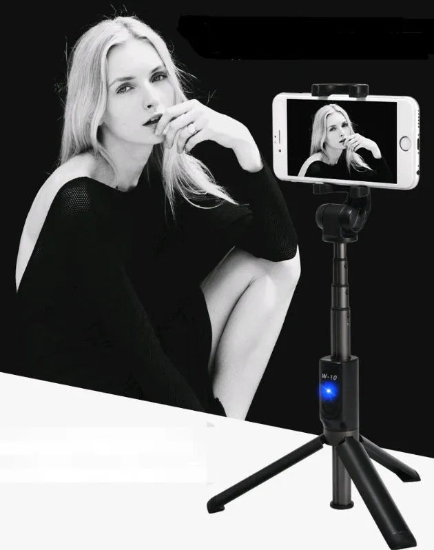 Aluminium Bluetooth selfie stick with tripod base and remote control extended with mobile phone attached