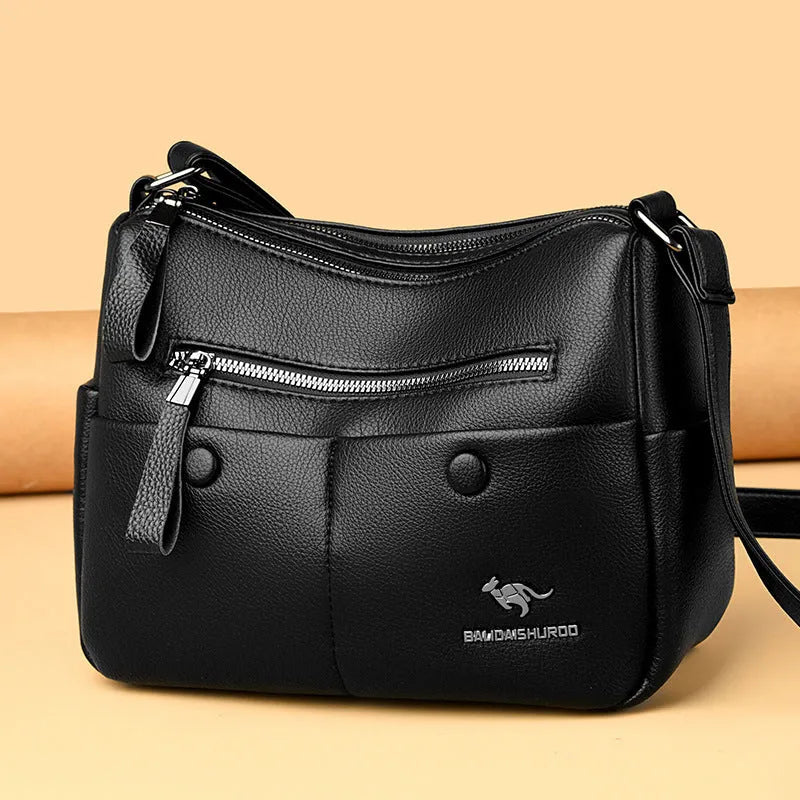 Soft PU leather crossbody bag in horizontal square shape with stitching details