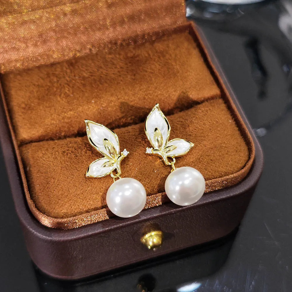 Copper butterfly drop earrings with electroplated finish and zircon painting detail for women