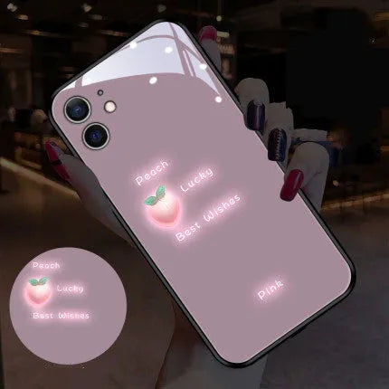 White TPU iPhone case with painted purple daisies and letters, showing voice-activated colour light feature.