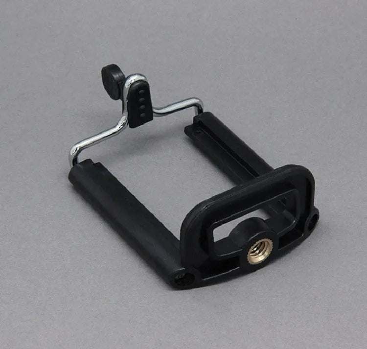 Black octopus tripod with flexible legs and spherical gimbal ball head for cameras and smartphones