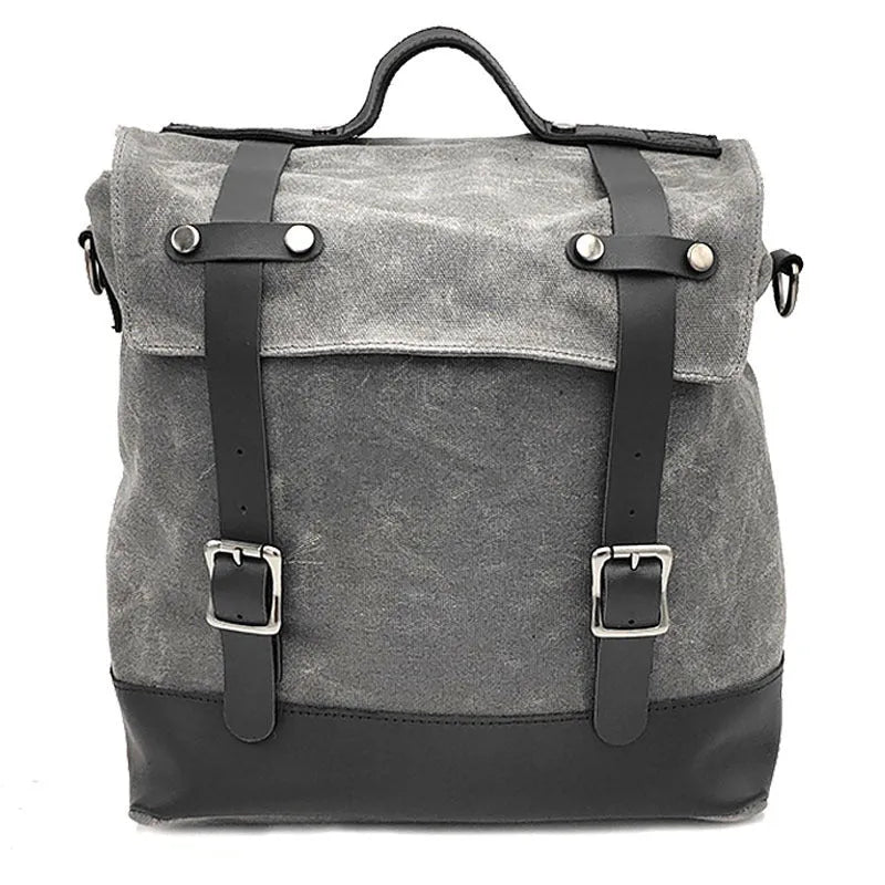 Black waterproof canvas motorcycle side bag with dimensions 300x280x150mm mounted on motorcycle