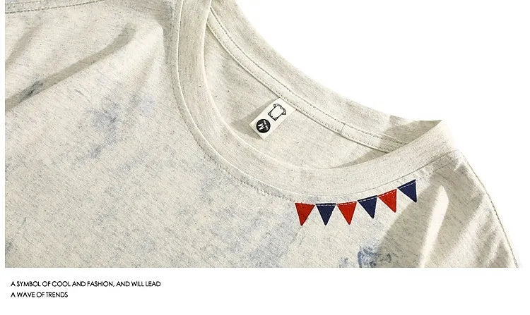 Grey loose fit t-shirt with an all-over tie dye print and short sleeves.