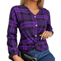 Women's loose fit purple plaid casual shirt with regular sleeves on a hanger.