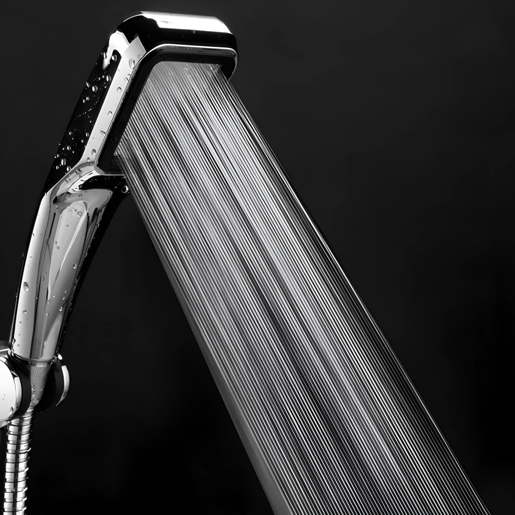 Orange hand-held pressurised shower head with rain spray function